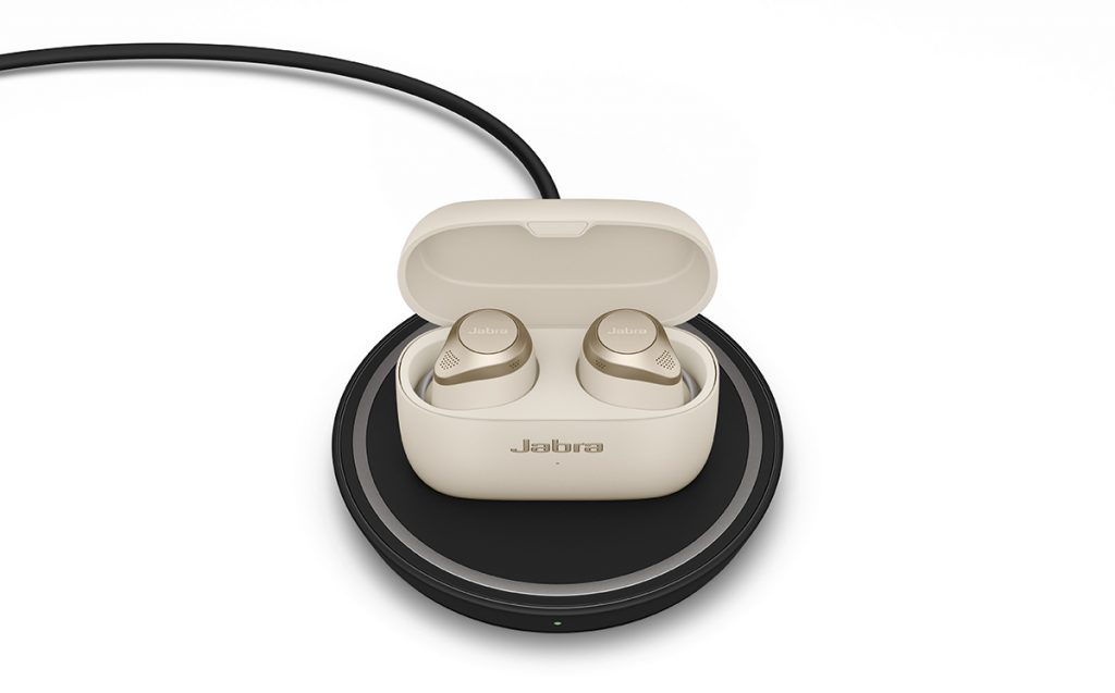 Jabra Elite 85t earphones on wireless charging pad